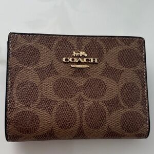 Coach Brown Signature Compact Wallet with Gold Logo